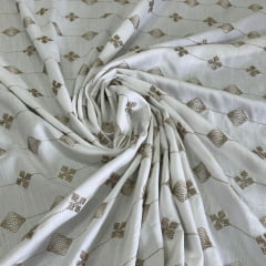 TECIDO VISCOLINHO OFF WHITE COM BORDADO BEGE 10% VISCOSE, 98% POLIÉSTER E 2% LUREX COM 1,45 LG